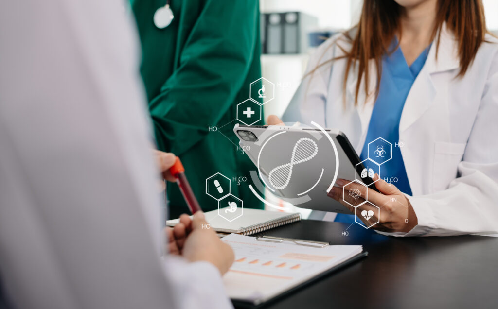 Healthcare professionals discussing medical data with digital health icons, emphasizing credentialing and compliance in medical practices.